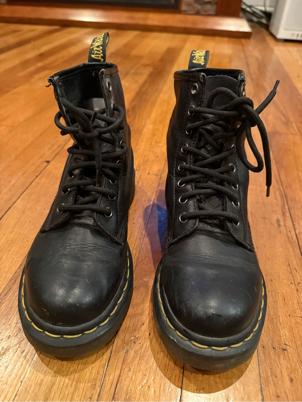 Dr. Martens Black Leather Lace-Up Boots with Yellow Stitching and Heel Loop